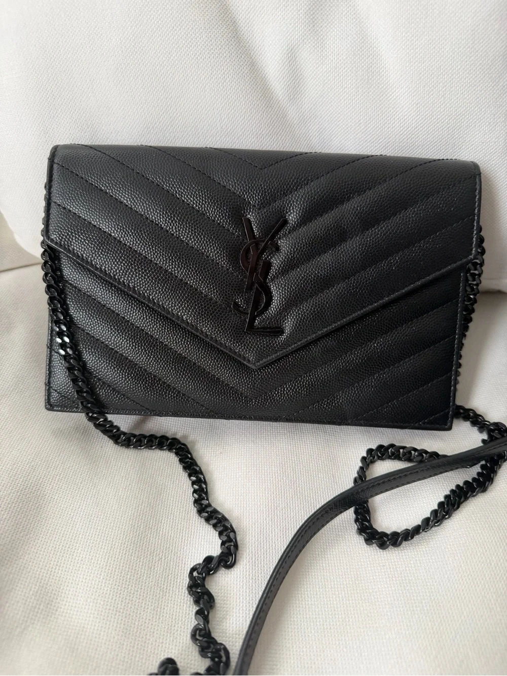Saint Laurent Envelope Chain Wallet black monochrome design .